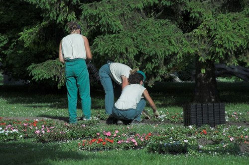 Gardener in Barking wearing PPE during outdoor maintenance